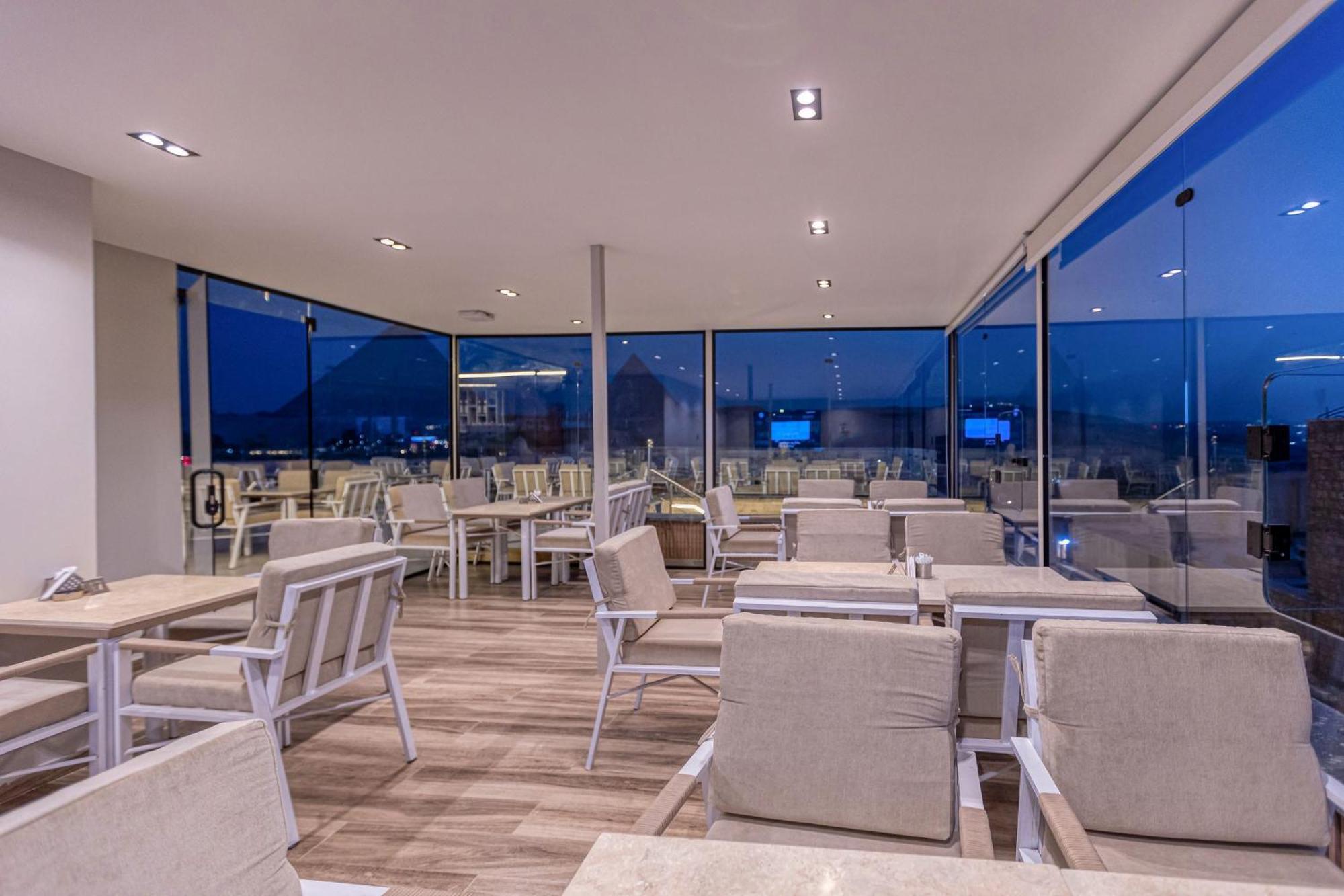 Gaia Pyramids Hotel Kafret el-Gabal Exterior photo